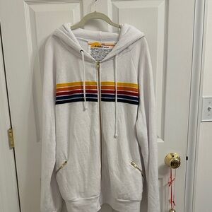 Aviator Nation White Zip Hoodie with Yellow Orange Red and Navy Stripes